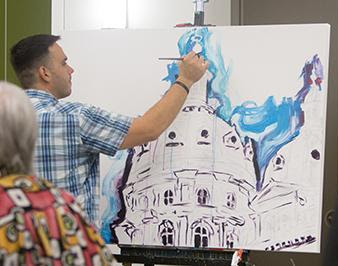 man illustrating Capitol Building
