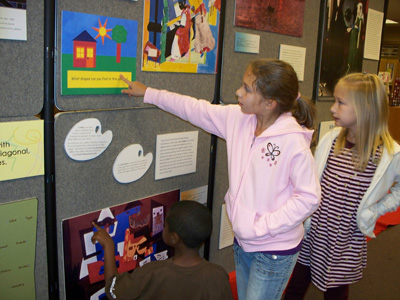 At the Waynesboro Library, students enjoy the Museum on Wheels. Photograph by Judi Holifield